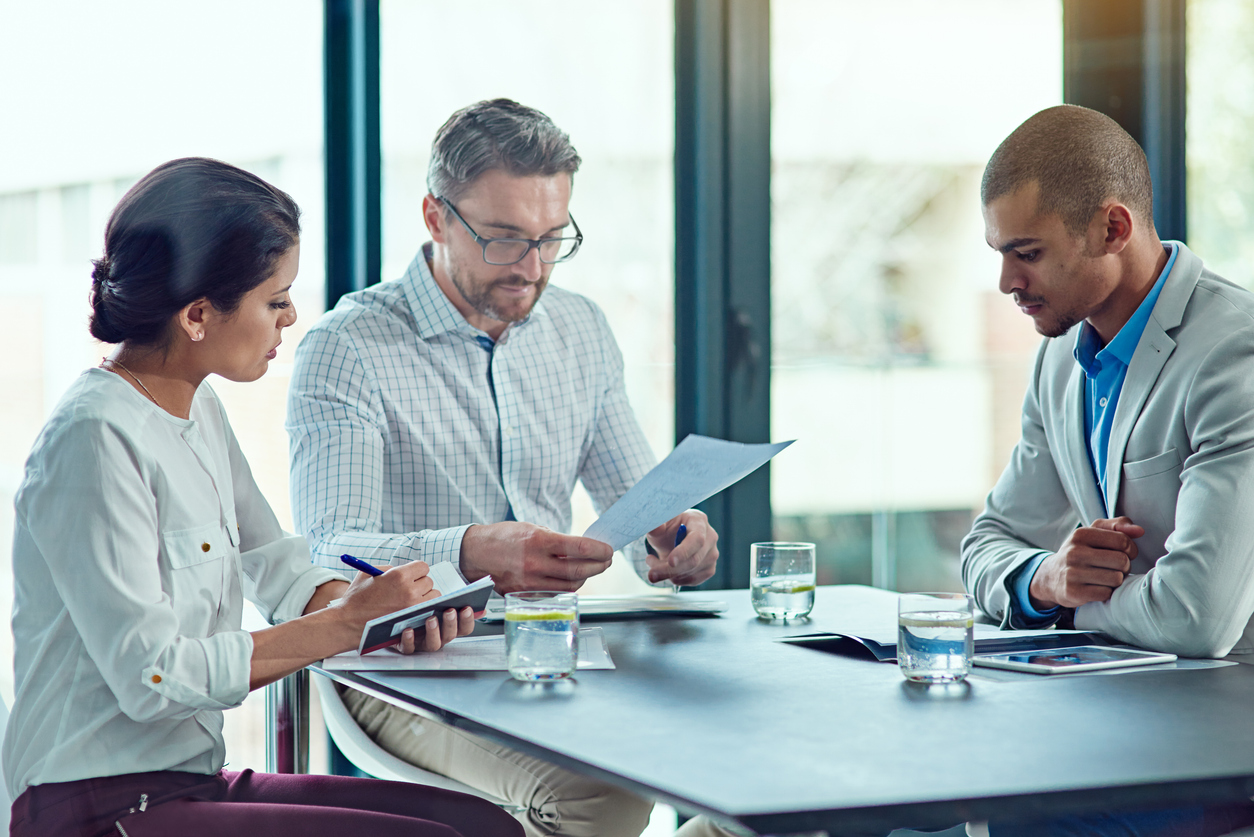 Policy Makers Working Around a Conference Table..jpg