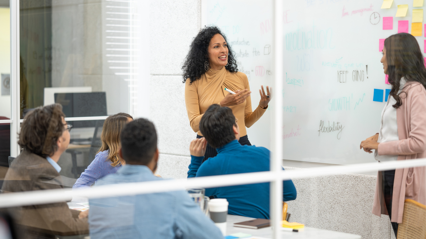 A Project Manager Leads Her Team in a Brainstorming Session..jpg