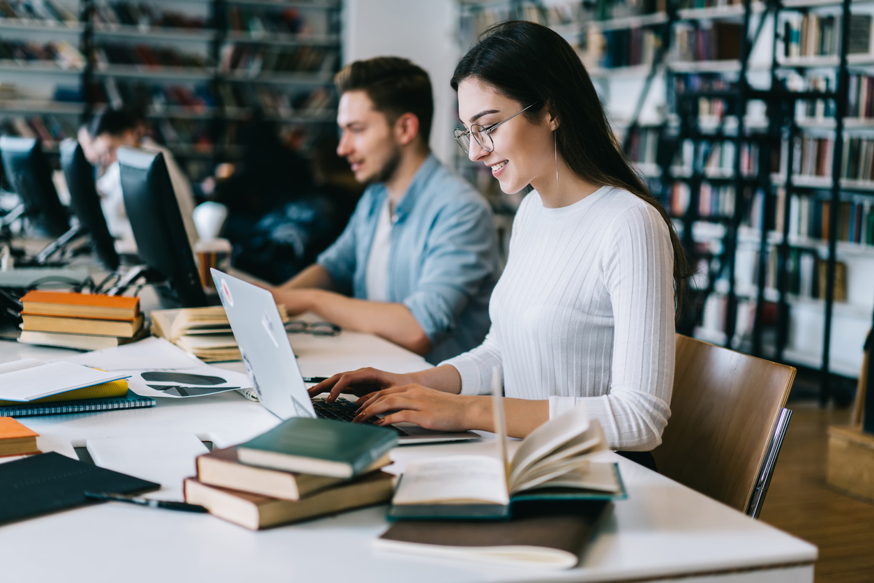 Two Accounting Students Study for the Cpa Exam in the Library..jpg