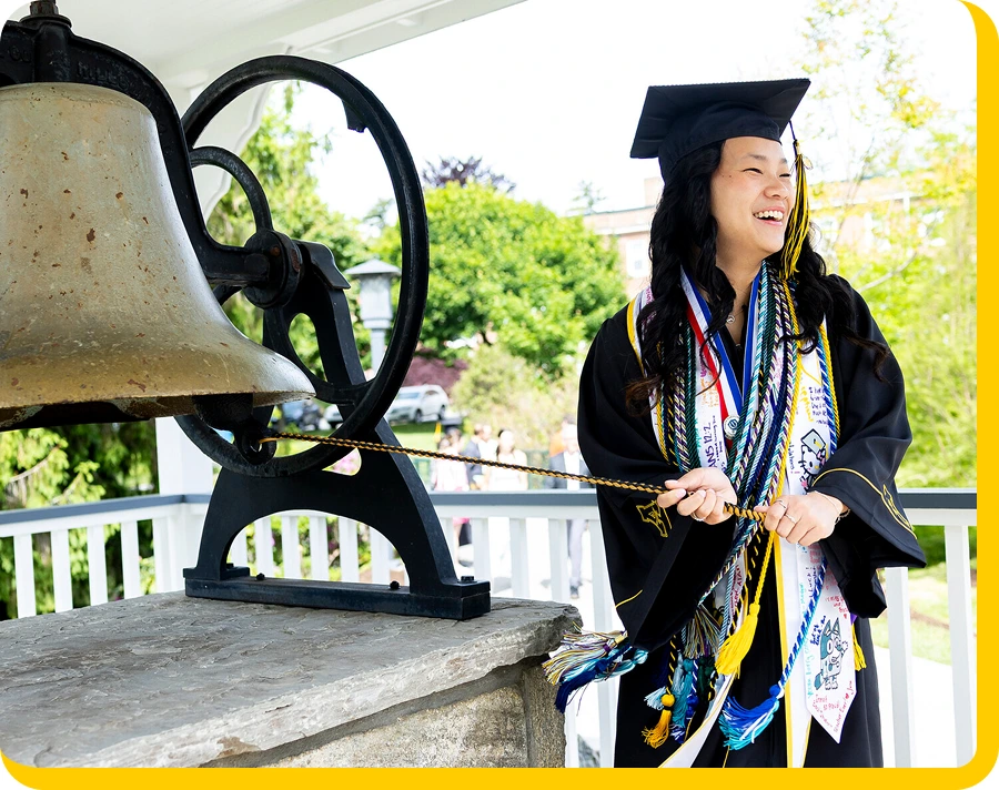 App State graduate ringing the bell